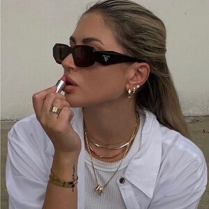 AUTHENTIC Prada Black Sunglasses with silver Logo Accent